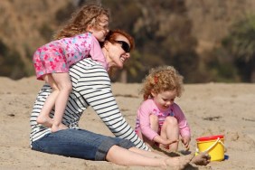 Marcia Cross, beach, white and black striped top, denim capris, sunglasses, sand buckets, sand pails, twin daughters